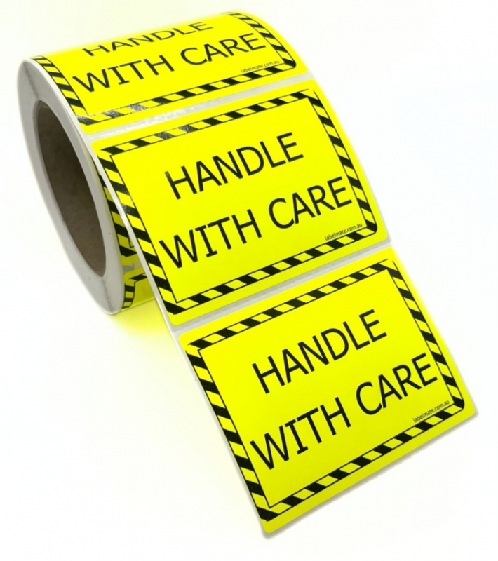 100×75 HANDLE WITH CARE Fluro Yellow Warning Label Roll Black Printed